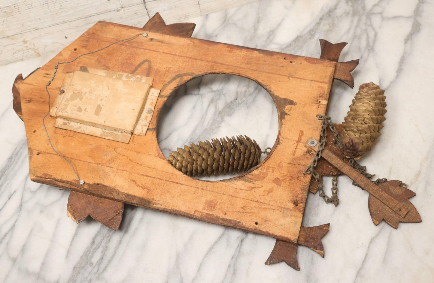 Lot 163 - Antique Folk Art Wooden Cuckoo Clock Cover With Spring-Mounted Cuckoo And Gilt Pine Cone Weights