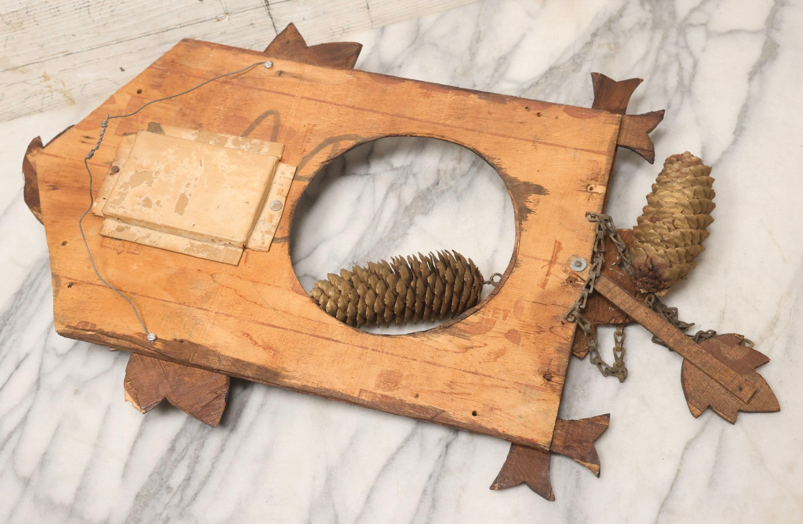 Lot 163 - Antique Folk Art Wooden Cuckoo Clock Cover With Spring-Mounted Cuckoo And Gilt Pine Cone Weights