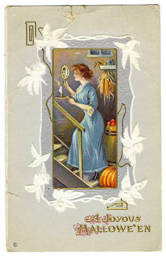 Lot 191 - Antique Embossed Halloween Postcard “A Joyous Hallowe'en” With Woman Gazing In Mirror By Candlelight, Series 345 F, Postmarked 1913 Bristol Vt, Written On Verso