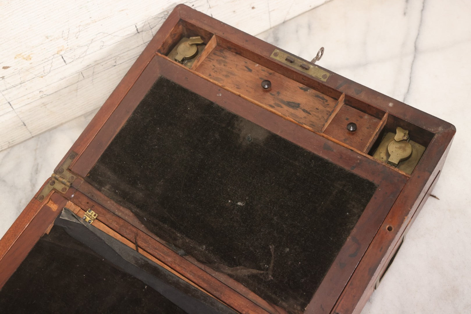 Lot 007 - Antique Folding Wooden Writing Lap Desk With Velvet Interior, Brass Hardware, And Dual Inkwells, Circa Late 19th Century