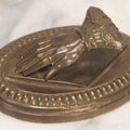 Lot 013 - Antique Pressed Brass Hand-Form Paperweight Clip On Weighted Oval Base, Circa Late 19th Century