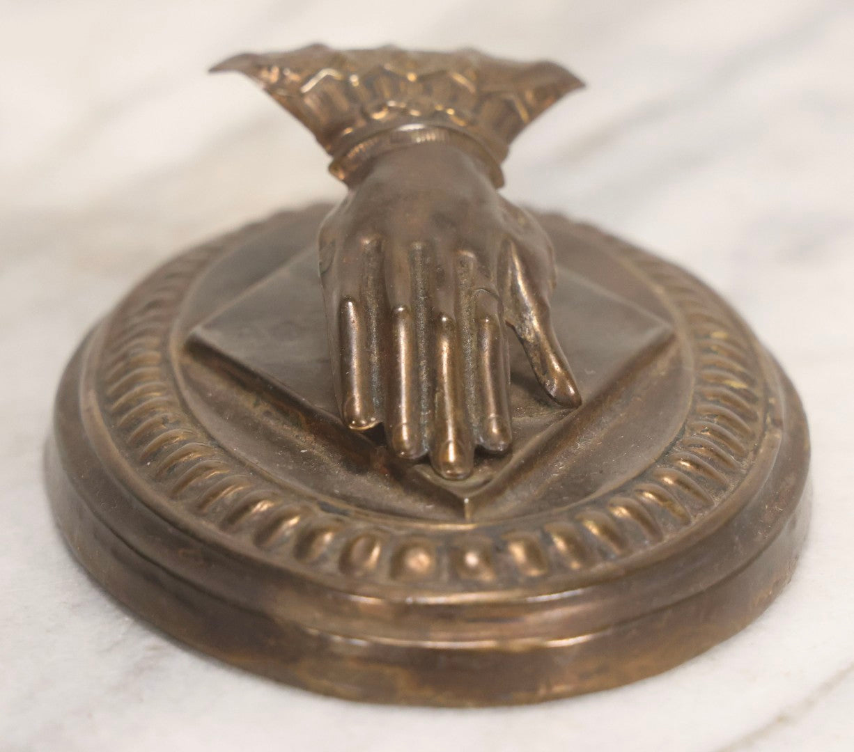 Lot 013 - Antique Pressed Brass Hand-Form Paperweight Clip On Weighted Oval Base, Circa Late 19th Century