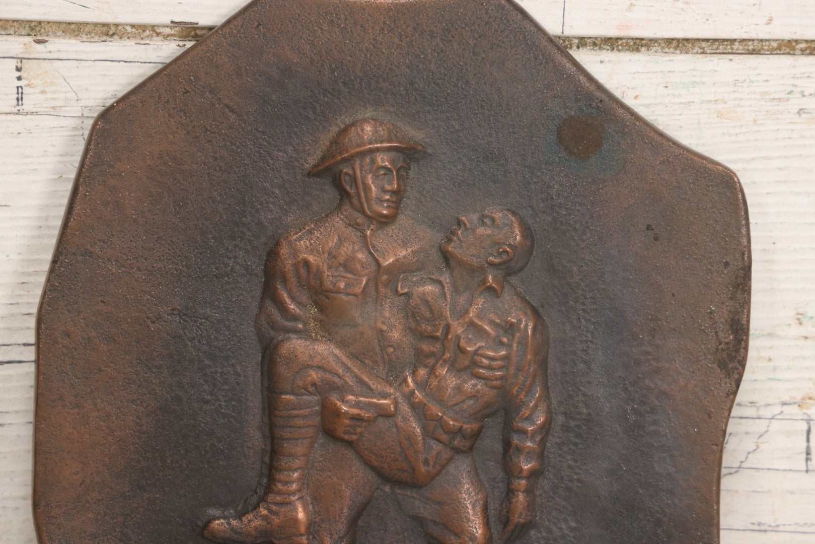 Lot 015 - Antique Bronze-Finished Metal Relief Plaque Depicting WWI Soldier Carrying Fallen Comrade, With Hanging Ring, 8-1/4" x 9-5/8"