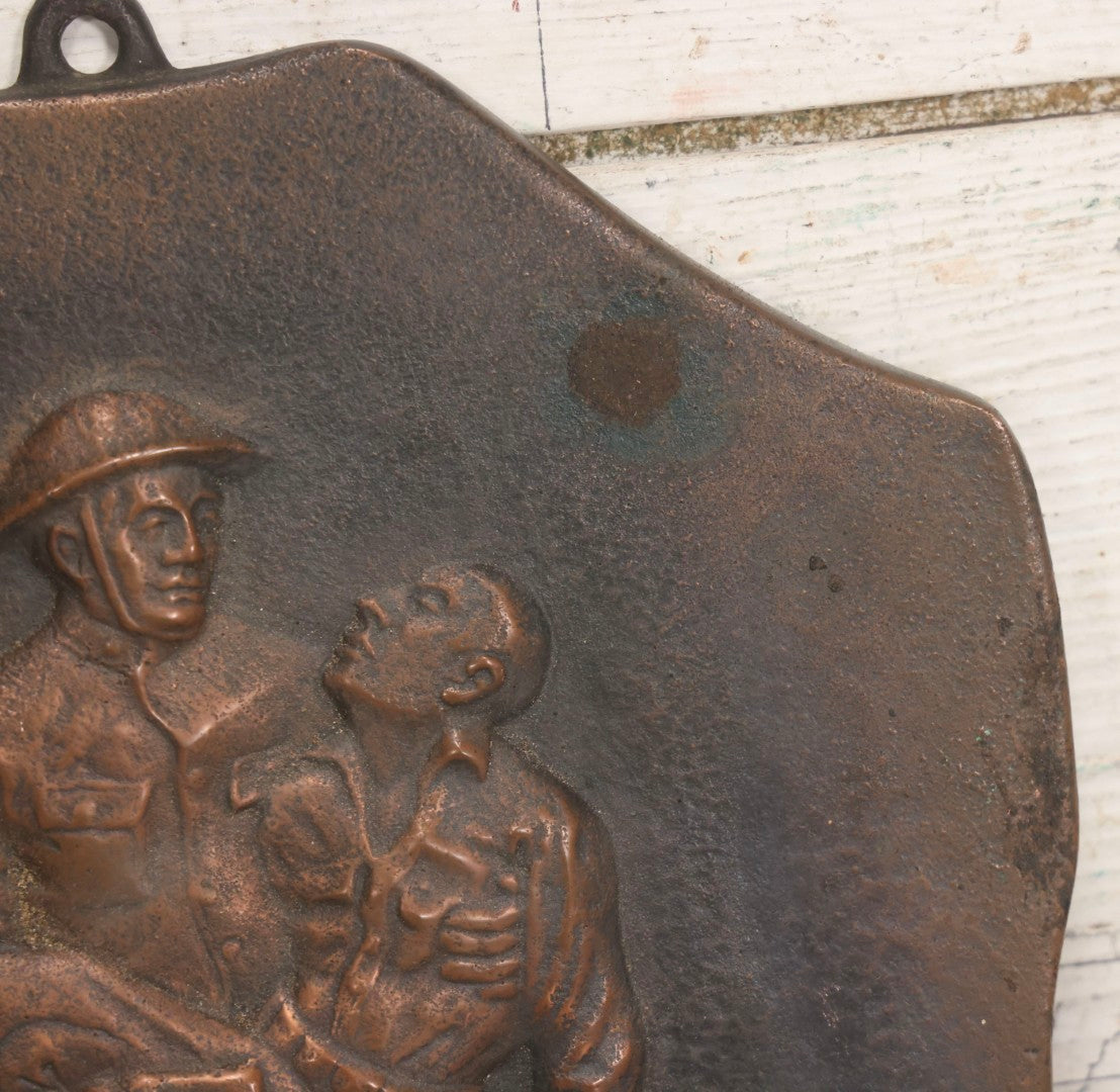 Lot 015 - Antique Bronze-Finished Metal Relief Plaque Depicting WWI Soldier Carrying Fallen Comrade, With Hanging Ring, 8-1/4" x 9-5/8"