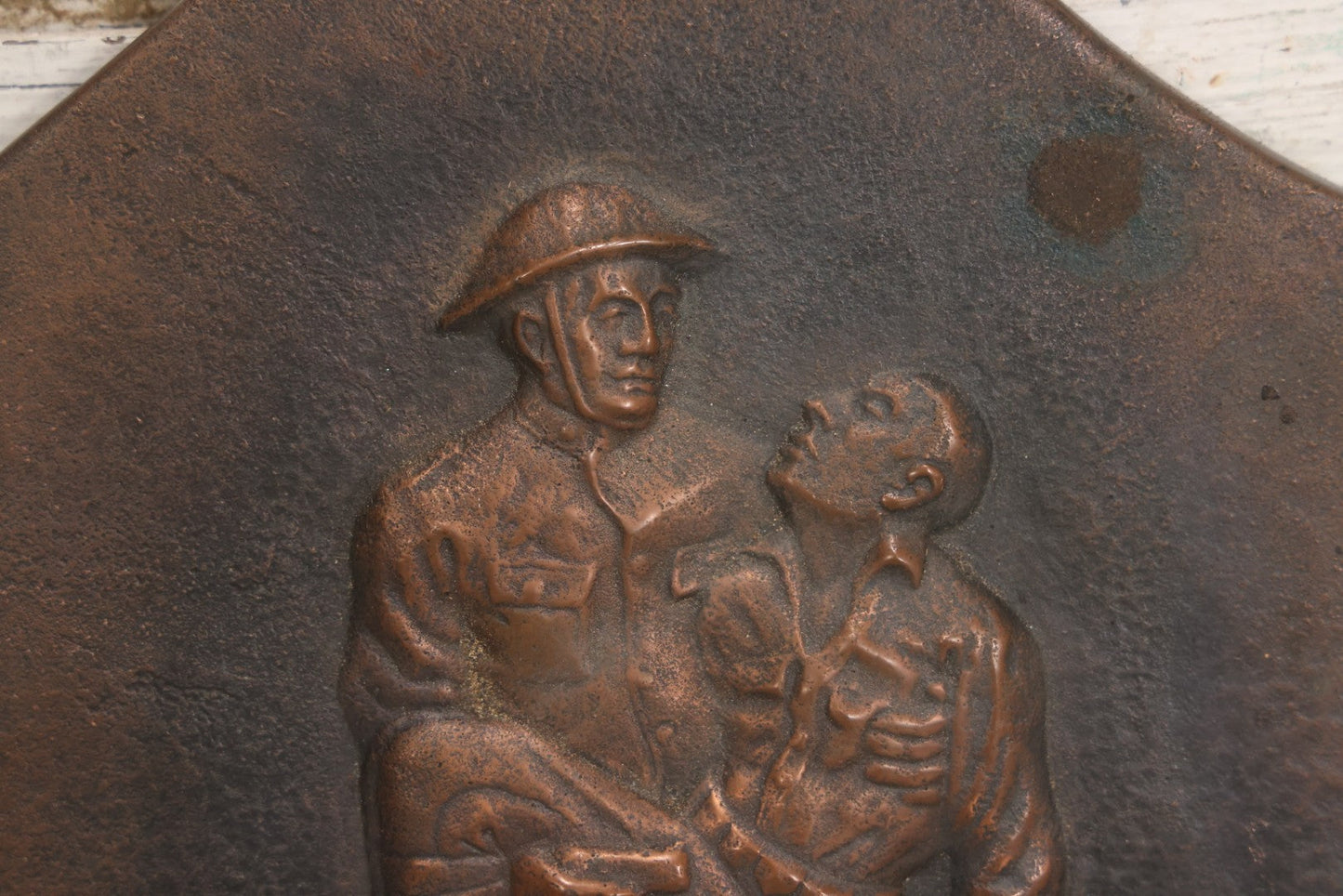 Lot 015 - Antique Bronze-Finished Metal Relief Plaque Depicting WWI Soldier Carrying Fallen Comrade, With Hanging Ring, 8-1/4" x 9-5/8"