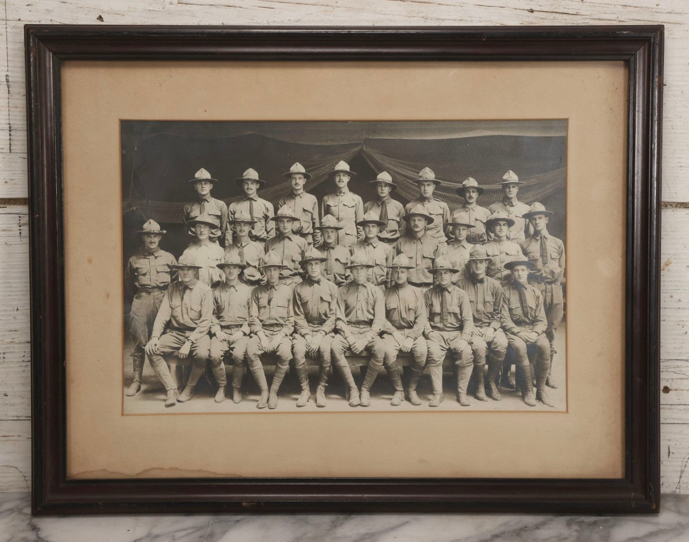 Lot 016 - Antique Boareded Photograph Of U.S. Army Soldiers In Early World War I Service Uniforms With Campaign Hats, Circa 1917–1918, In Frame, 17-5/8" x 13-5/8"
