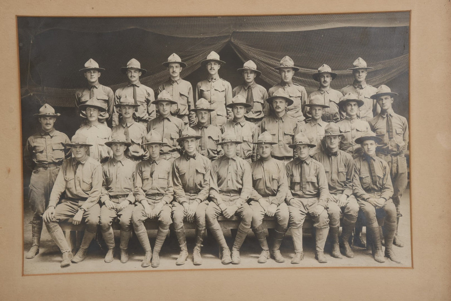 Lot 016 - Antique Boareded Photograph Of U.S. Army Soldiers In Early World War I Service Uniforms With Campaign Hats, Circa 1917–1918, In Frame, 17-5/8" x 13-5/8"