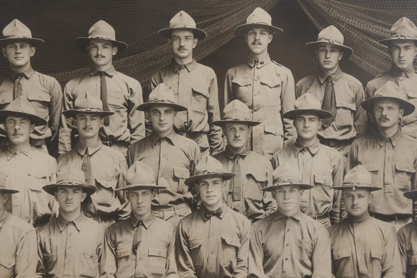Lot 016 - Antique Boareded Photograph Of U.S. Army Soldiers In Early World War I Service Uniforms With Campaign Hats, Circa 1917–1918, In Frame, 17-5/8" x 13-5/8"