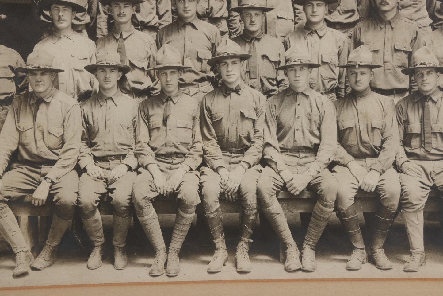 Lot 016 - Antique Boareded Photograph Of U.S. Army Soldiers In Early World War I Service Uniforms With Campaign Hats, Circa 1917–1918, In Frame, 17-5/8" x 13-5/8"