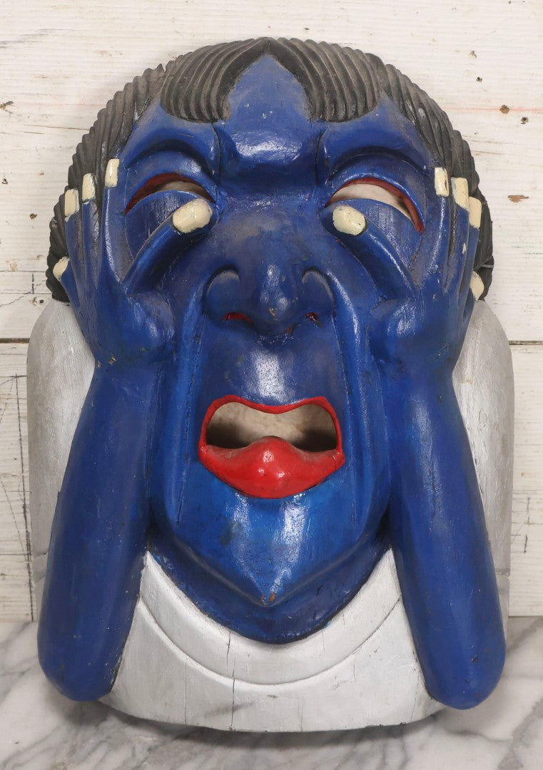 Lot 019 - Vintage Hand-Carved Folk Art Wooden Mask Depicting Blue Man With Hands To Face, Painted Finish, 12-1/4" x 16-3/4"
