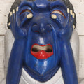 Lot 019 - Vintage Hand-Carved Folk Art Wooden Mask Depicting Blue Man With Hands To Face, Painted Finish, 12-1/4" x 16-3/4"