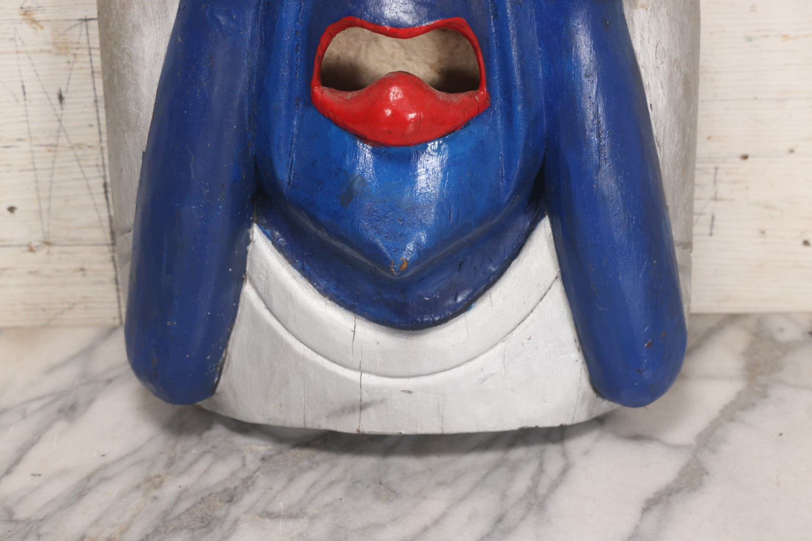 Lot 019 - Vintage Hand-Carved Folk Art Wooden Mask Depicting Blue Man With Hands To Face, Painted Finish, 12-1/4" x 16-3/4"