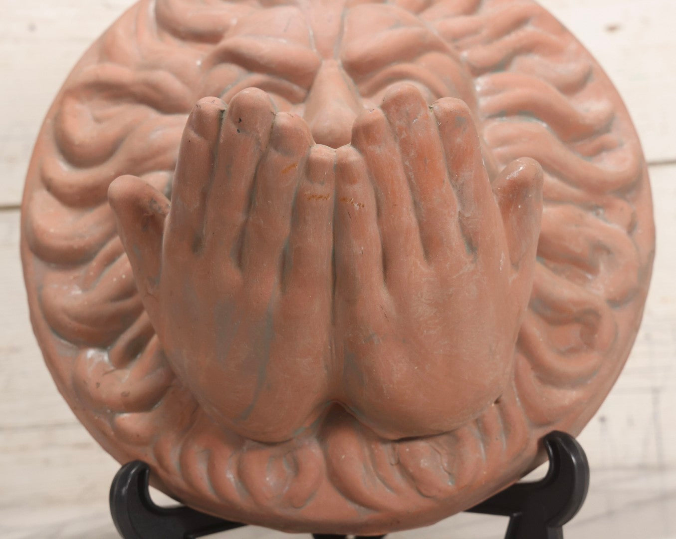 Lot 020 - Vintage Unglazed Ceramic Greenman Wall Plaque With Relief Face Blowing Over Pair Of Hands, Cold-Painted Surface, Marked "B P" On Verso, 13-3/4" Diameter