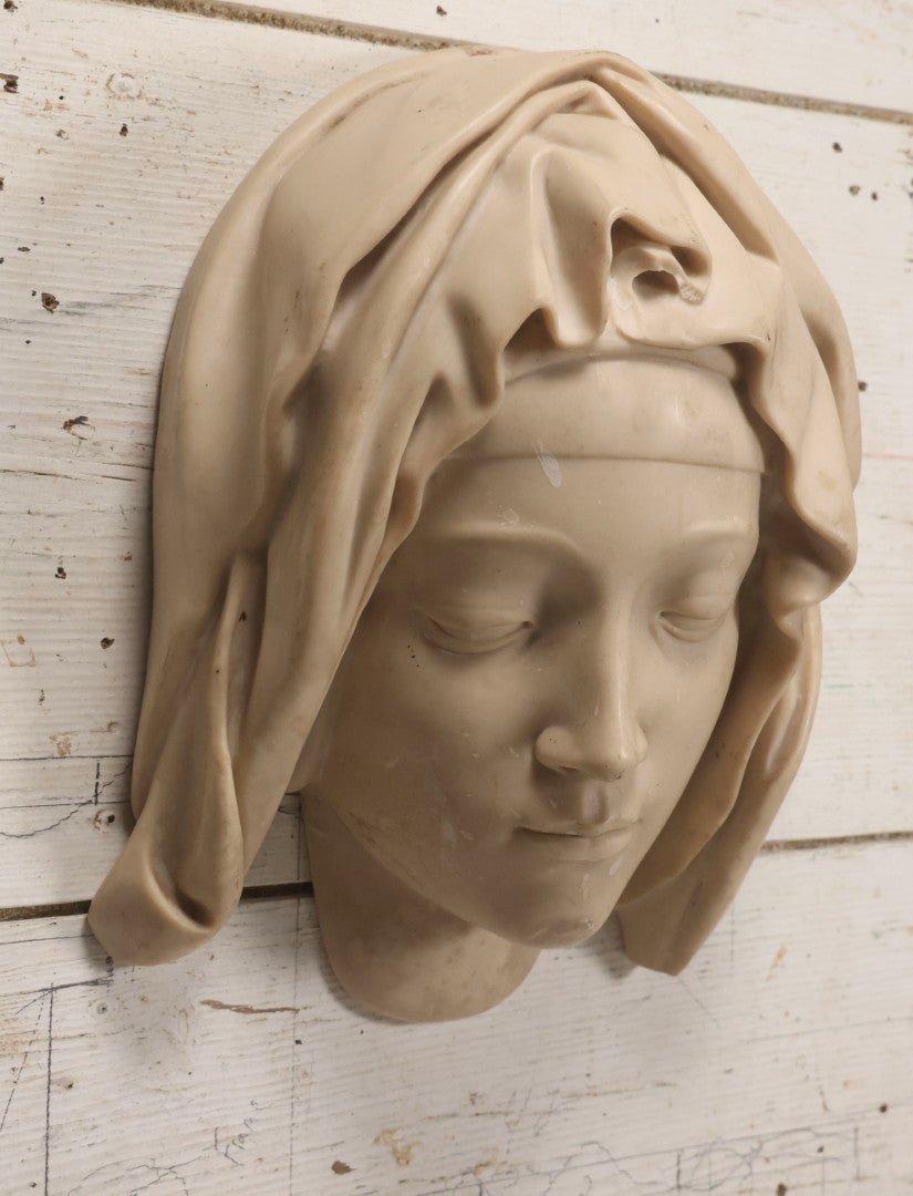 Lot 022 - Vintage Cold Cast Composite Polymer And Marble Wall Sculpture "Head Of The Virgin," Authorized Reproduction Of Michelangelo's Pietà By The Metropolitan Museum Of Art And Vatican Museums, Note Chip To Veil, 13-1/4" H