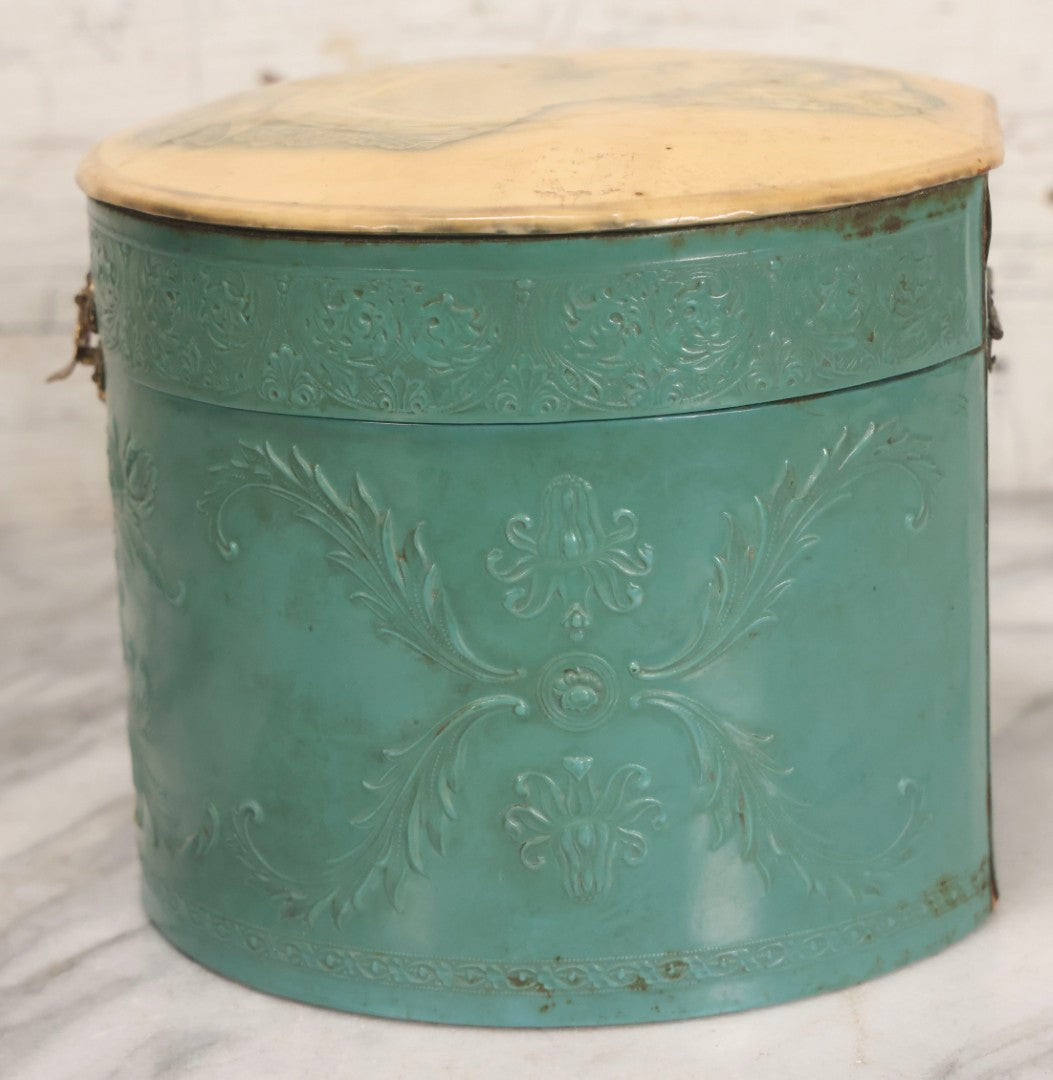 Lot 028 - Antique Blue-Green And White Celluloid Collar Box With Printed Portrait Of Woman, Pink Fabric Lining, And Arrow Cluett Peabody & Co. Collar, 6" H