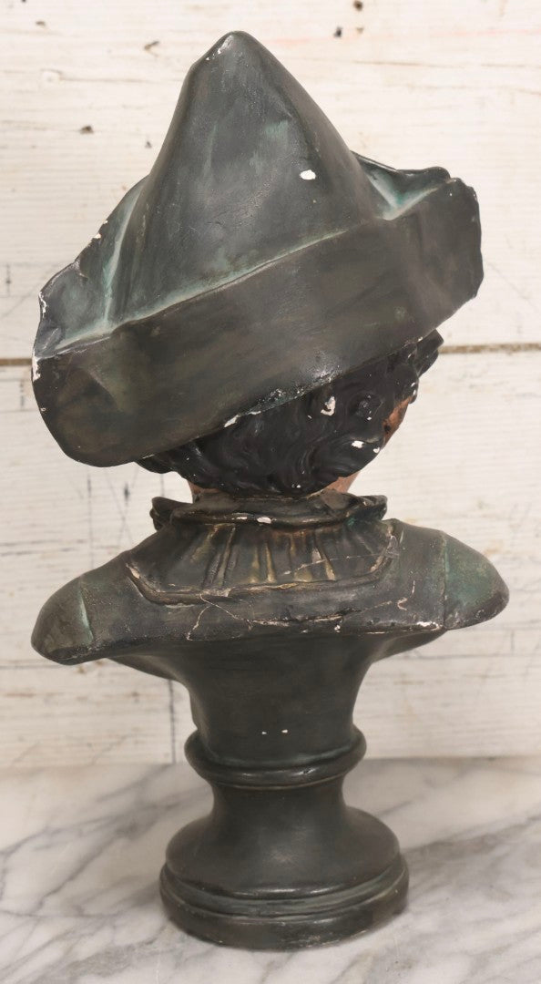 Lot 032 - Antique Hand Painted Chalkware Bust Of Boy In Green Ruffle Collared Shirt And Folded Paper Style Hat With Black Band And Green Top, 15" H