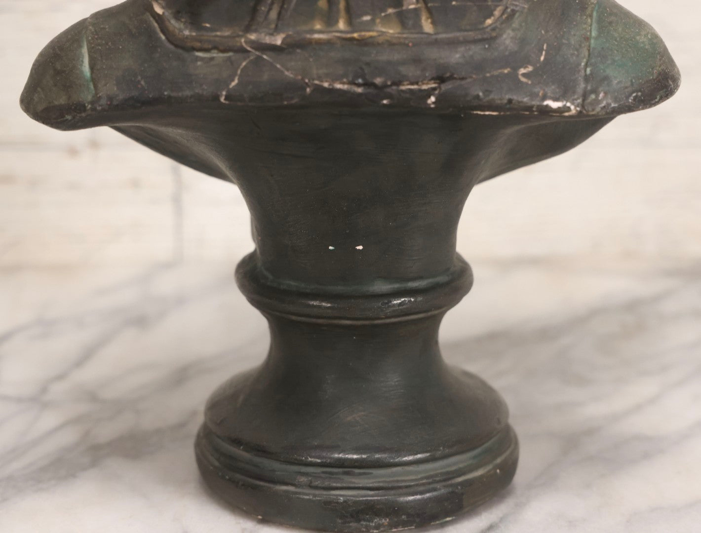 Lot 032 - Antique Hand Painted Chalkware Bust Of Boy In Green Ruffle Collared Shirt And Folded Paper Style Hat With Black Band And Green Top, 15" H