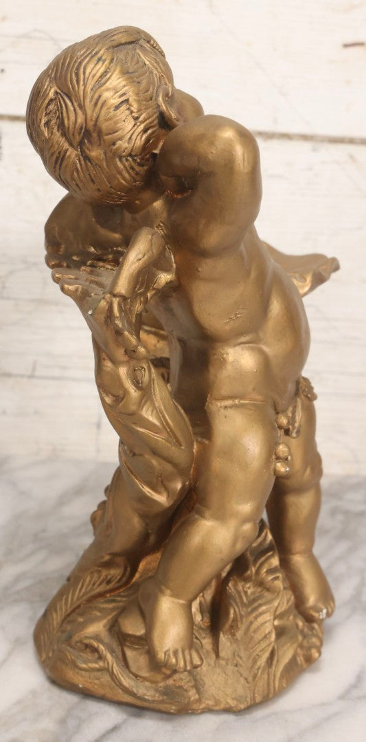Lot 034 - Vintage Gold-Painted Chalkware Statue Of Yawning Cupid With Grapes, Vines, And Crab Motif, 11-3/4" H