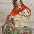 Lot 036 - Antique Staffordshire Porcelain Figure Of Girl In Red Hood With Basket And Dog, Possibly Little Red Riding Hood, 7-1/2" H