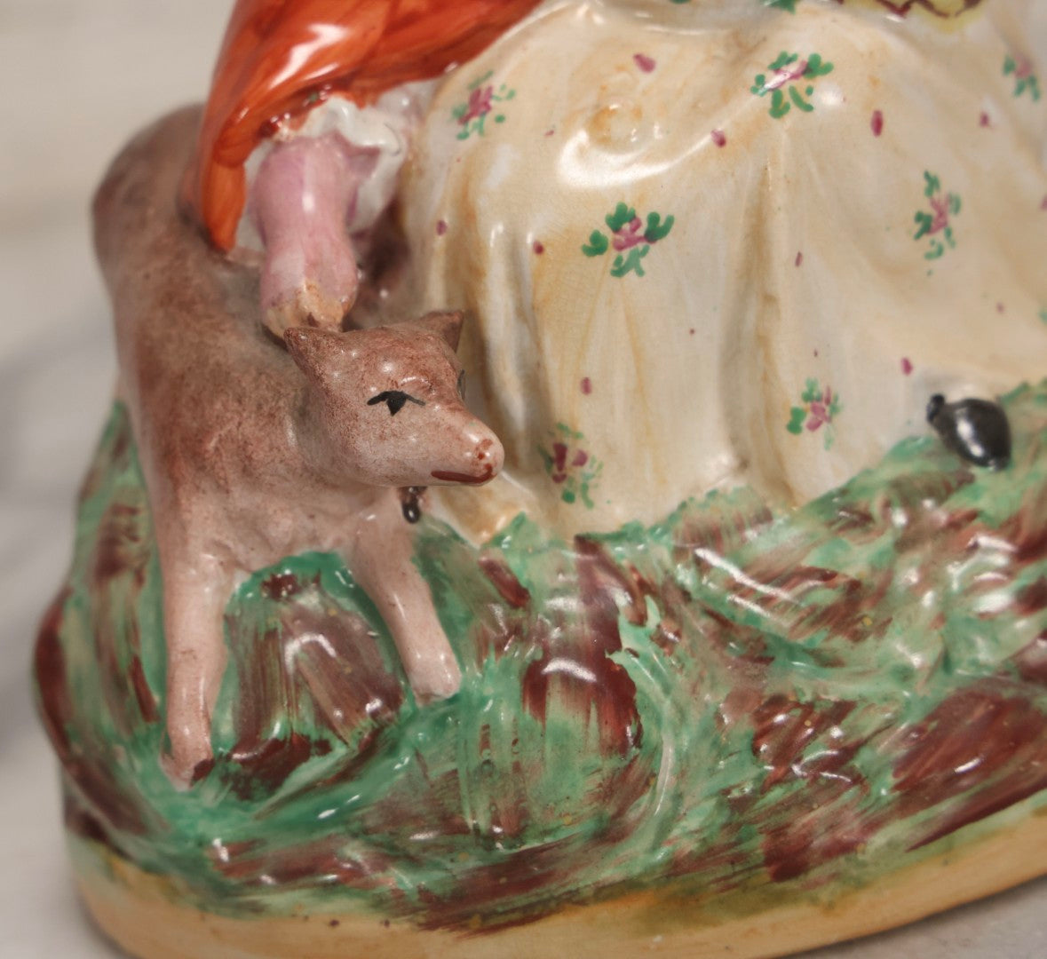 Lot 036 - Antique Staffordshire Porcelain Figure Of Girl In Red Hood With Basket And Dog, Possibly Little Red Riding Hood, 7-1/2" H