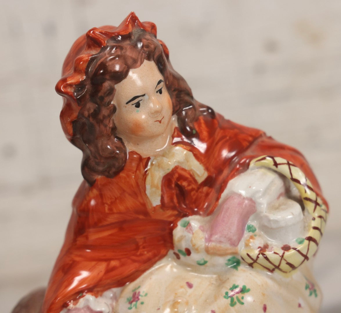 Lot 036 - Antique Staffordshire Porcelain Figure Of Girl In Red Hood With Basket And Dog, Possibly Little Red Riding Hood, 7-1/2" H