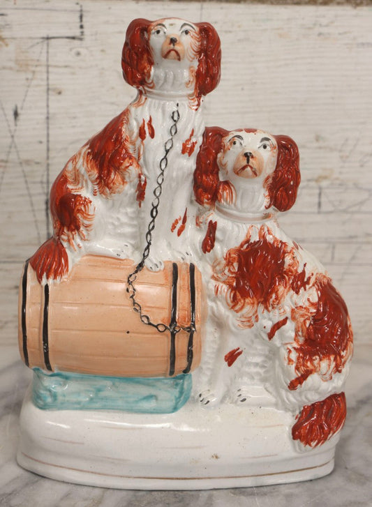 Lot 037 - Antique Staffordshire-Style Pottery Figurine Of Spaniel Dogs On Barrel With Crackle Finish, Circa 1880, 8-7/8" H
