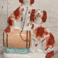 Lot 037 - Antique Staffordshire-Style Pottery Figurine Of Spaniel Dogs On Barrel With Crackle Finish, Circa 1880, 8-7/8" H
