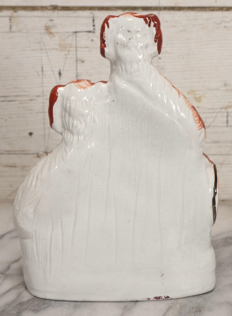 Lot 037 - Antique Staffordshire-Style Pottery Figurine Of Spaniel Dogs On Barrel With Crackle Finish, Circa 1880, 8-7/8" H