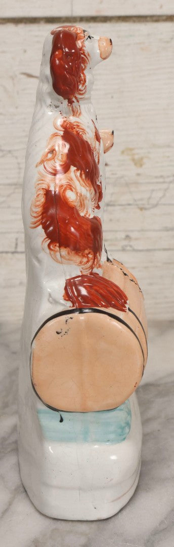Lot 037 - Antique Staffordshire-Style Pottery Figurine Of Spaniel Dogs On Barrel With Crackle Finish, Circa 1880, 8-7/8" H
