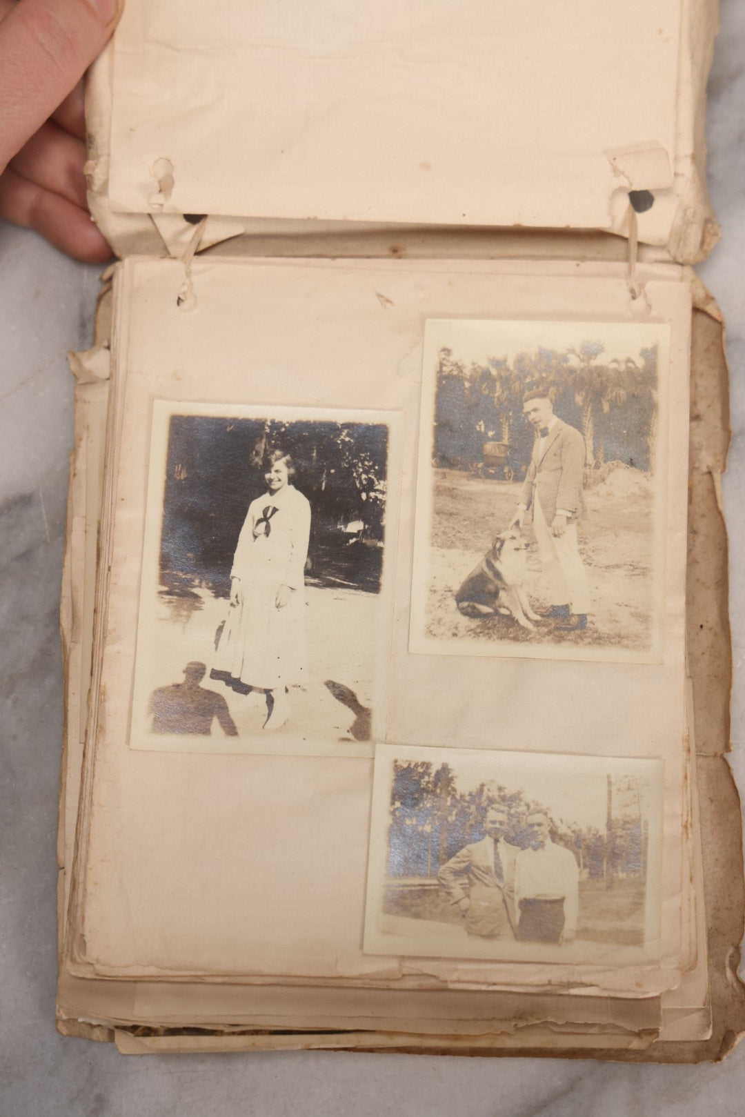 Lot 040 - Antique "Kewpie Book" Snapshot Photo Album And Scrapbook Of Johanna Cecile Powell, Hand-Painted Cover With Rose O'Neill-Style Kewpies, Containing Notes, Photographs, And Ephemera From The “Kewpie Klub,” Stetson University, Circa 1917–1920