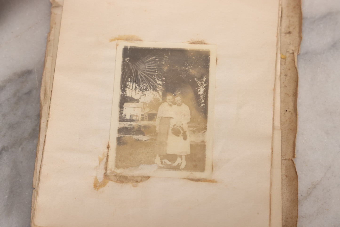 Lot 040 - Antique "Kewpie Book" Snapshot Photo Album And Scrapbook Of Johanna Cecile Powell, Hand-Painted Cover With Rose O'Neill-Style Kewpies, Containing Notes, Photographs, And Ephemera From The “Kewpie Klub,” Stetson University, Circa 1917–1920