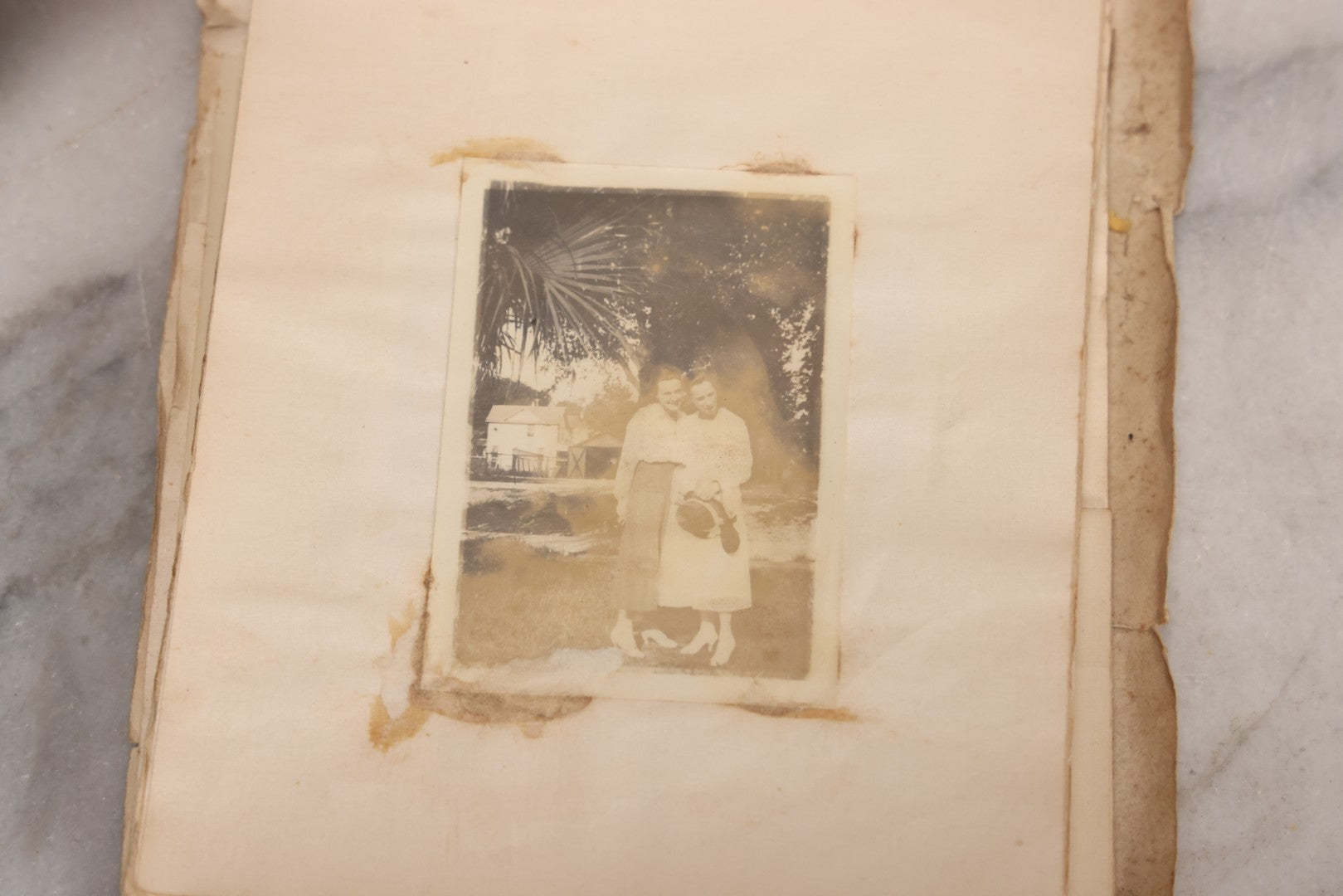 Lot 040 - Antique "Kewpie Book" Snapshot Photo Album And Scrapbook Of Johanna Cecile Powell, Hand-Painted Cover With Rose O'Neill-Style Kewpies, Containing Notes, Photographs, And Ephemera From The “Kewpie Klub,” Stetson University, Circa 1917–1920