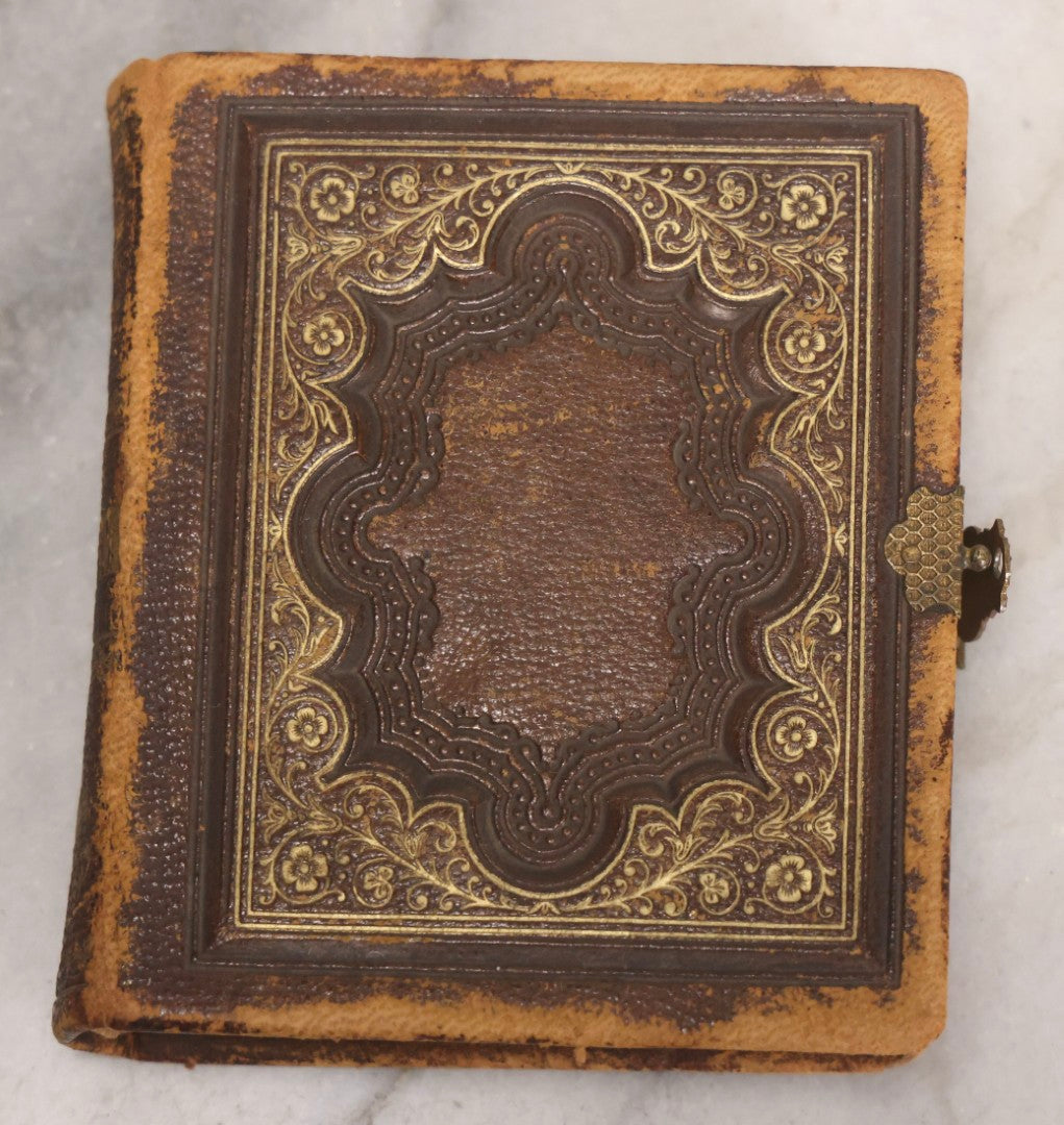 Lot 041 - Antique Complete Gem Tintype Photo Album Containing 96 Images On 12 Double-Sided Pages, Including Boy With Dog, Group And Pair Portraits, And Finely Executed Individual Studies