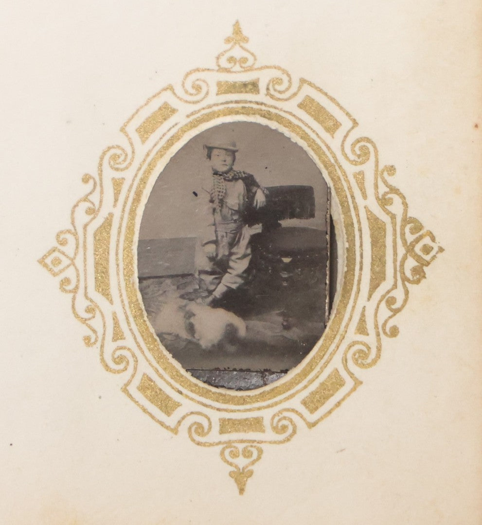 Lot 041 - Antique Complete Gem Tintype Photo Album Containing 96 Images On 12 Double-Sided Pages, Including Boy With Dog, Group And Pair Portraits, And Finely Executed Individual Studies