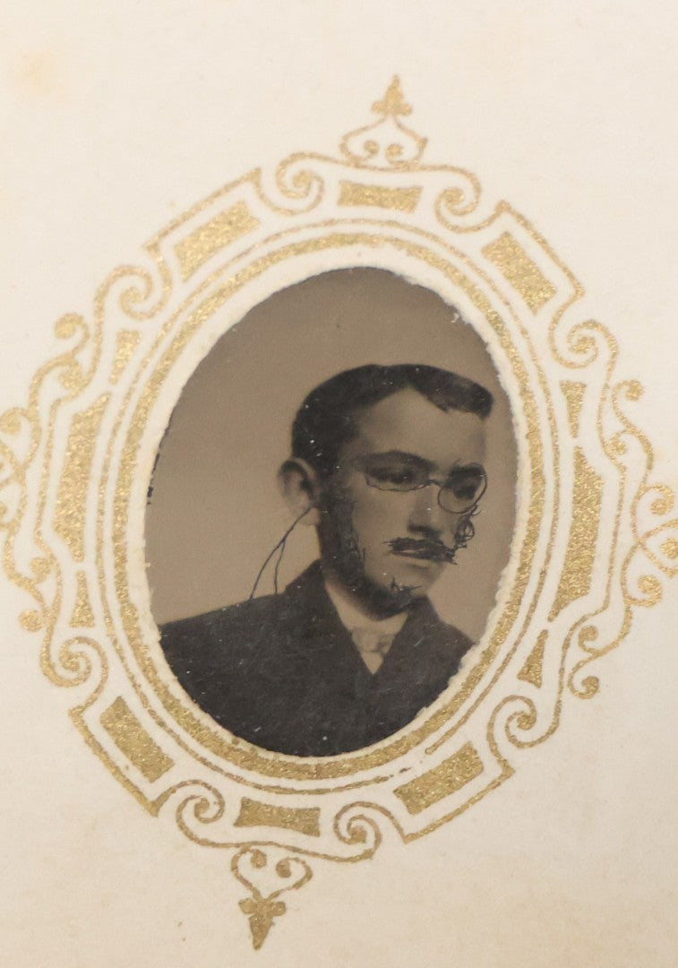 Lot 041 - Antique Complete Gem Tintype Photo Album Containing 96 Images On 12 Double-Sided Pages, Including Boy With Dog, Group And Pair Portraits, And Finely Executed Individual Studies