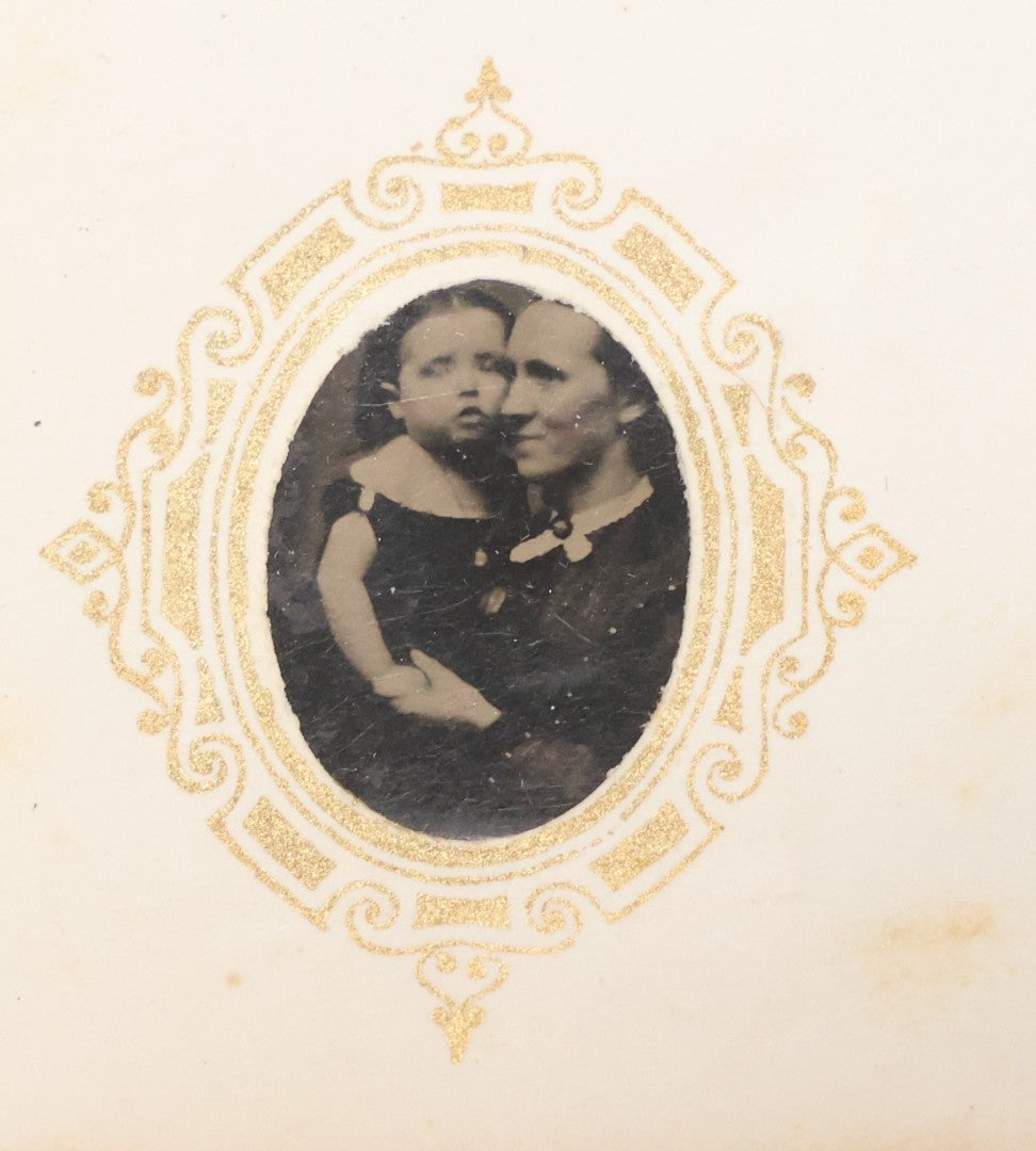 Lot 041 - Antique Complete Gem Tintype Photo Album Containing 96 Images On 12 Double-Sided Pages, Including Boy With Dog, Group And Pair Portraits, And Finely Executed Individual Studies