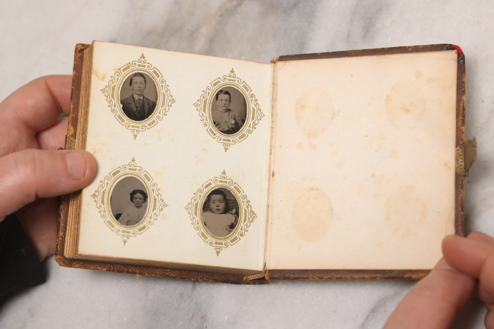 Lot 041 - Antique Complete Gem Tintype Photo Album Containing 96 Images On 12 Double-Sided Pages, Including Boy With Dog, Group And Pair Portraits, And Finely Executed Individual Studies