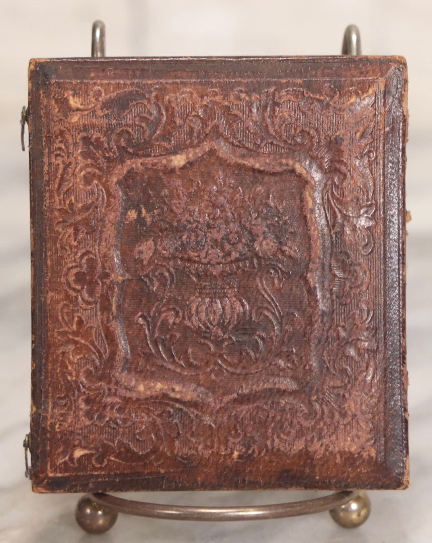 Lot 043 - Antique 1/6th Plate Daguerreotype Photograph Of Young Married Woman With Hand-Painted Gold Jewelry, In Full Split Leatherette Union Case With Embossed Bouquet Design