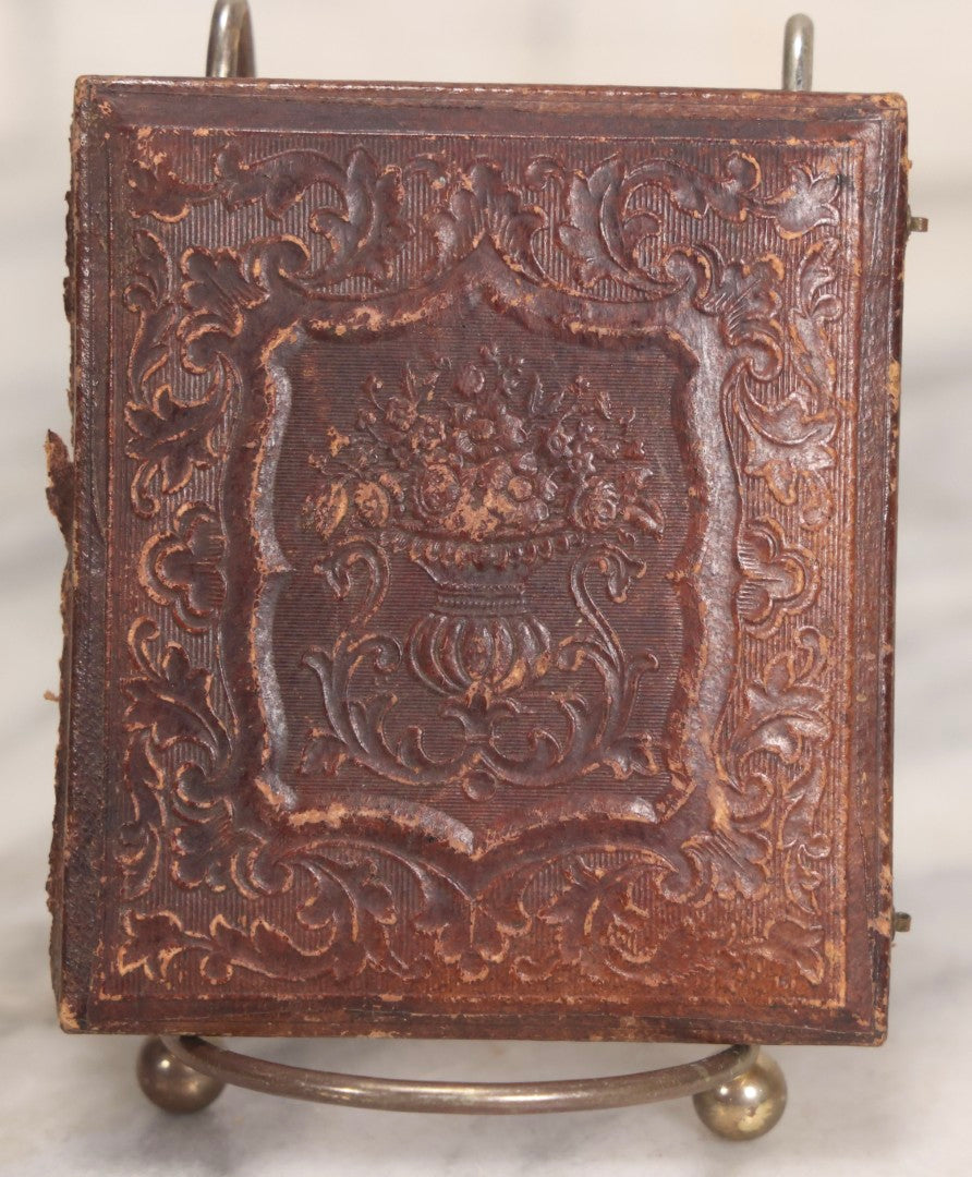 Lot 043 - Antique 1/6th Plate Daguerreotype Photograph Of Young Married Woman With Hand-Painted Gold Jewelry, In Full Split Leatherette Union Case With Embossed Bouquet Design