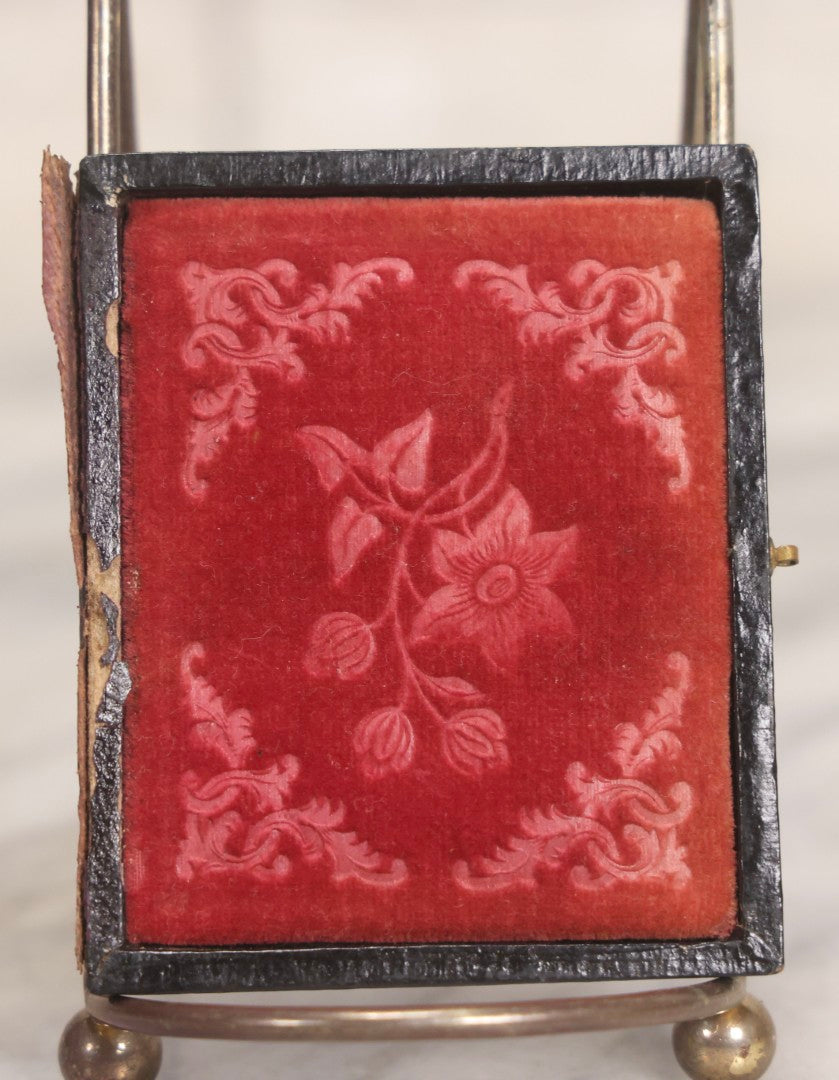 Lot 045 - Antique 1/9th Plate Daguerreotype Photograph Of Young Man In Bowtie, In Full Split Leatherette Union Case