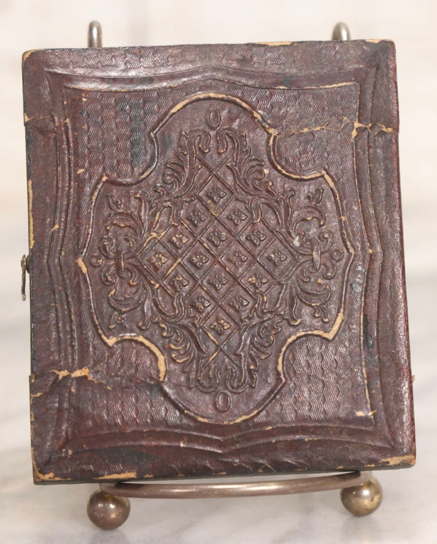 Lot 047 - Antique 1/6th Plate Ruby Ambrotype Photograph Of Elderly Woman In White Bonnet Holding Object, Possibly A Book, In Full Split Leatherette Union Case