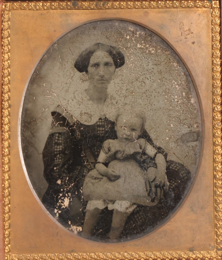 Lot 049 - Antique 1/6th Plate Ambrotype Photograph Of Seated Woman With Baby In Half Leatherette Union Case, Note Poor Condition