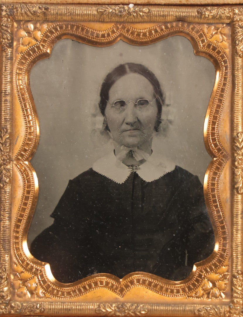 Lot 050 - Pair Of Antique 1/9th Plate Ruby Ambrotype Photographs Of Elderly Married Couple In Littlefield, Parsons & Co. Double Thermoplastic Union Case, Patented 1856–1857, With Herald Design