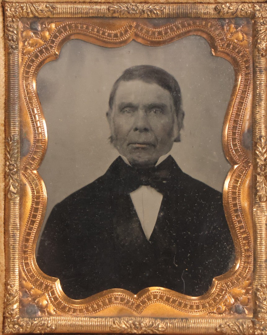 Lot 050 - Pair Of Antique 1/9th Plate Ruby Ambrotype Photographs Of Elderly Married Couple In Littlefield, Parsons & Co. Double Thermoplastic Union Case, Patented 1856–1857, With Herald Design