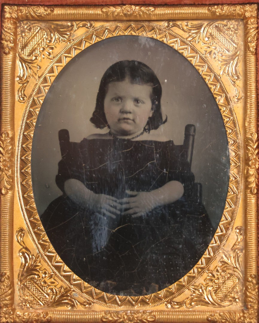 Lot 051 - Pair Of Antique 1/9th Plate Ruby Ambrotype Photographs Of Chubby Young Girl And Older Woman, Possibly Mother And Daughter, In Littlefield, Parsons & Co. Double Thermoplastic Union Case Patented 1856–1857, Note Crack To One Image