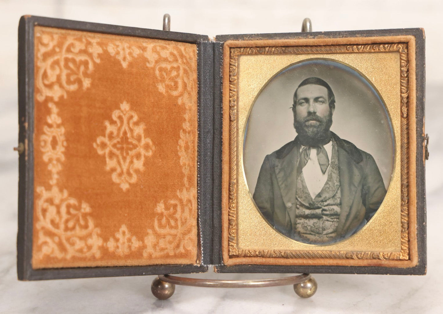 Lot 057 - Antique 1/6th Plate Ambrotype Photograph Of Bearded Man In Silk Neck Tie And Formal Dress, In Full Leatherette Union Case Repaired With Tape Hinge