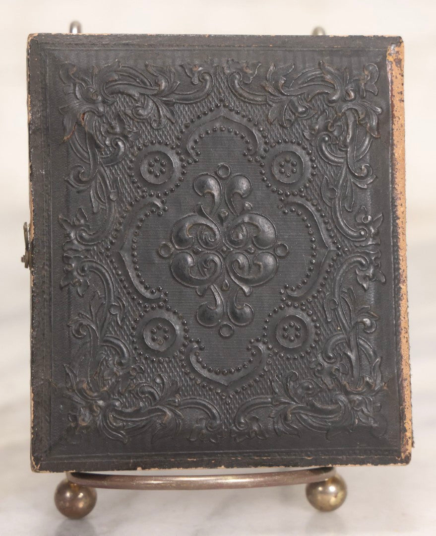 Lot 057 - Antique 1/6th Plate Ambrotype Photograph Of Bearded Man In Silk Neck Tie And Formal Dress, In Full Leatherette Union Case Repaired With Tape Hinge