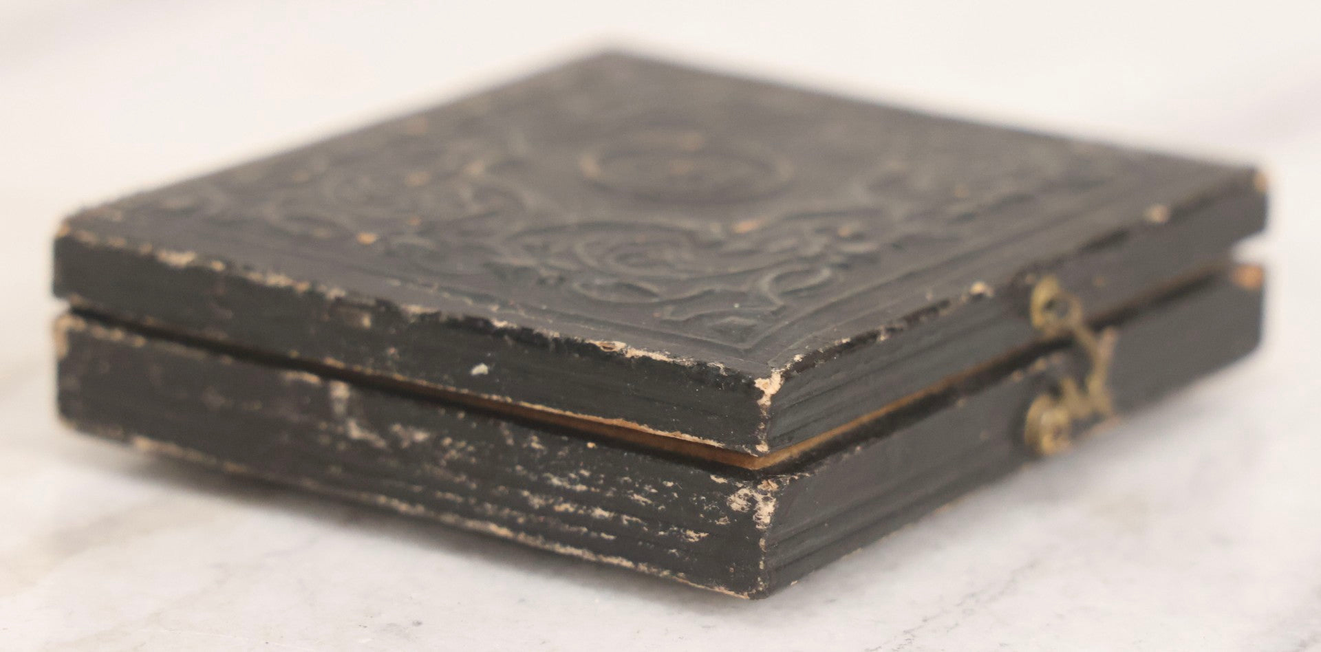 Lot 058 - Antique 1/9th Plate Hand-Tinted Ambrotype Photograph Of Woman With Shawl And Jewelry, In Full Leatherette Union Case Repaired With Taped Hinge