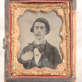 Lot 060 - Antique 1/9th Plate Tintype Photograph Of Young Man With Long Dark Hair And Giant Bowtie Smoking A Cigar, In Half Leatherette Union Case