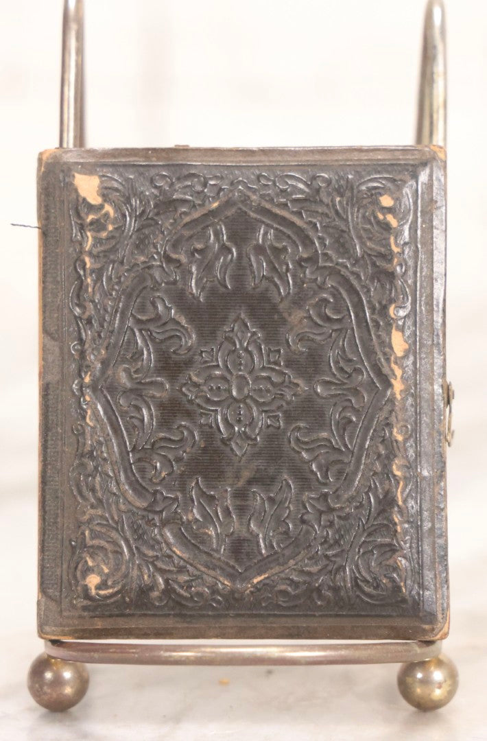 Lot 060 - Antique 1/9th Plate Tintype Photograph Of Young Man With Long Dark Hair And Giant Bowtie Smoking A Cigar, In Full Split Leatherette Union Case